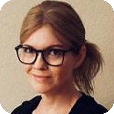 Woman with glasses smiling
