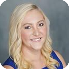 Blonde woman with wavy hair smiling