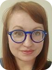 Red-haired woman wearing glasses